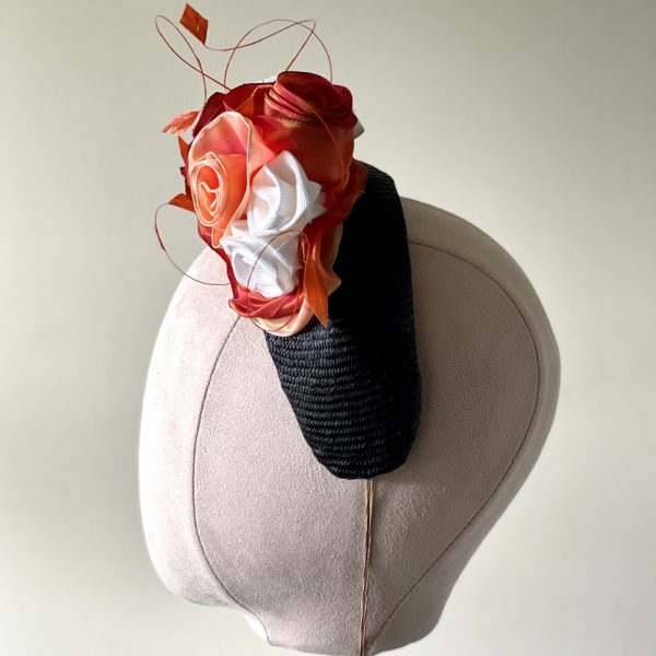 Olivia_side_decoration_detail black straw halo with vintage ribbon roses and coque feathers